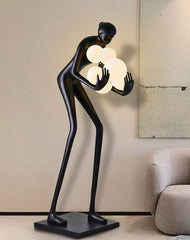 Artistic Ball Holding Floor Lamp